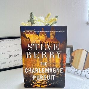 The Charlemagne Pursuit Hardcover Book - Orange/Gold Cover